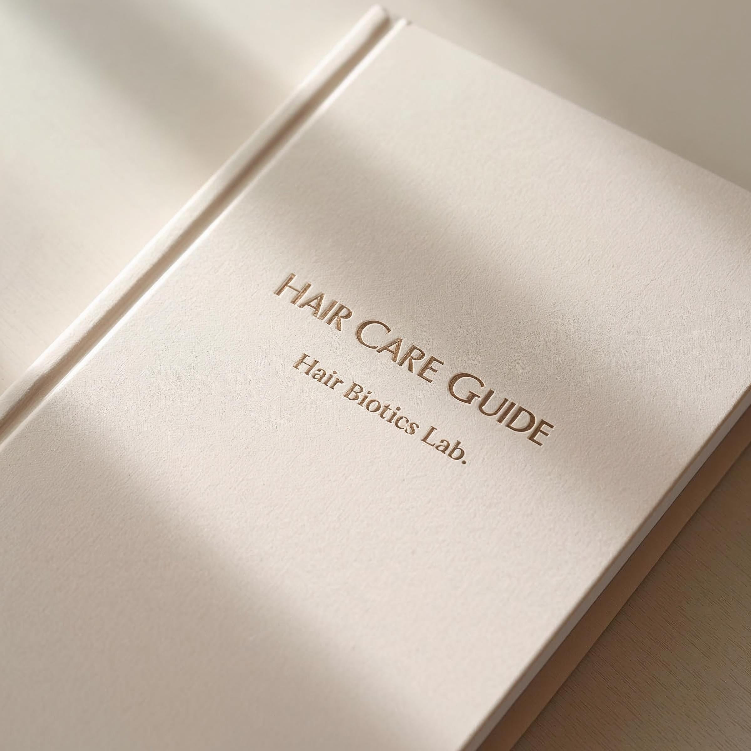 Hair care guide from Hair Biotics Lab on a beige background